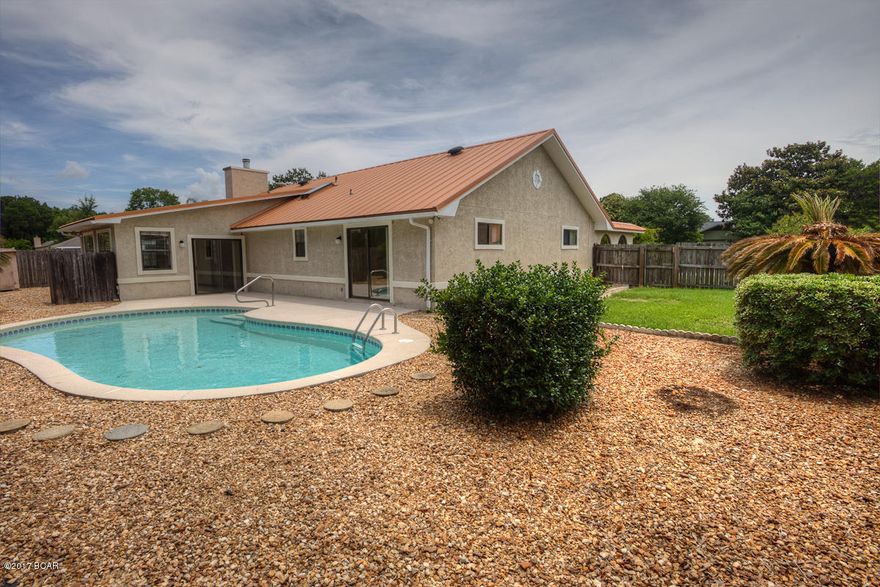 This home shows pride in ownership. Very well maintained home with ingorund pool, awesome metal roof, newer septic system,Florida room, wood burning fireplace, security system, No HOA fees, sprinklers in the front yard. Close to Lagoon & beach.