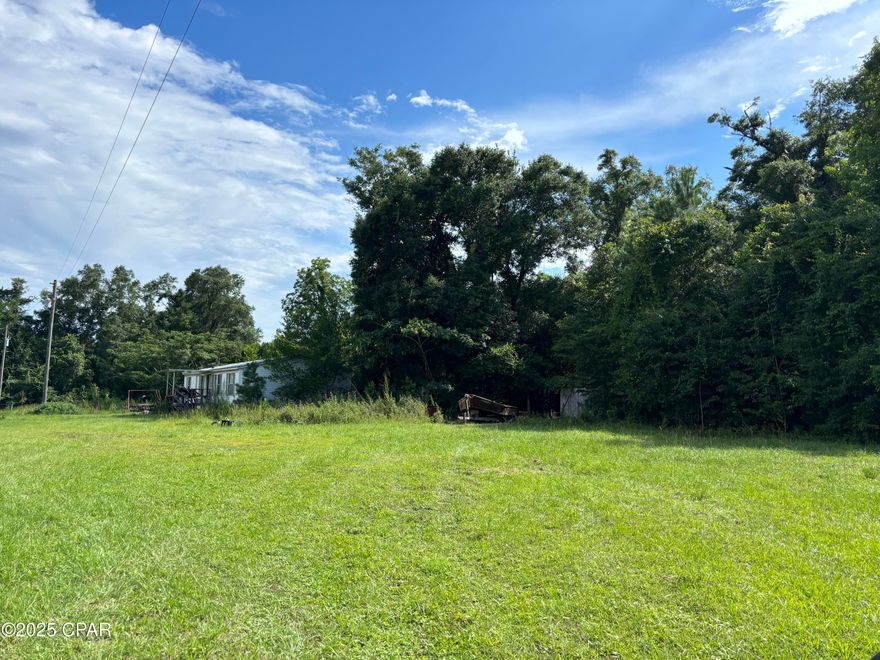 'CURRENTLY UNDER CONTRACT, SELLER ACCEPTING BACKUP OFFERS'

Welcome to 15745 NE Graves Street, located in the heart of the Hosford community! This 1.26-acre lot is ready for your next chapter—whether you're placing a mobile home or building new, this property offers plenty of room to create something special. With septic, power, and water available through Talquin Cooperative, many of the big steps are already in place.

Outdoor enthusiasts will love being just minutes from the Apalachicola National Forest, where you can enjoy hiking, hunting, and exploring miles of trails. Live in a small-town setting with a strong sense of community, while still being conveniently located—only 45 minutes to Tallahassee International Airport, about an hour to downtown, and just over an hour to the beautiful beaches of St. George Island.

The mobile home on the property is given no value, but the lot itself is full of potential. Whether you're looking for a peaceful place to settle or an affordable investment opportunity, this is worth a closer look.

Come experience the space, simplicity, and hometown charm this property offers. Schedule your showing today!