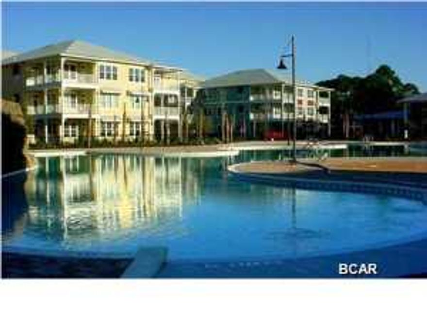 Experience an oasis at the beach. This is a 1 bedroom, 1 bath with a study/bunk room, 1069 sq. ft. condo in the beautiful and tranquil gated community of Island Reserve, located off Front Beach Road in Panama City Beach. This open floorplan features hardwood flooring in the main living area, tile in the bath and kitchen, and plush padded carpeting in the bedroom, all with 10' ceilings. The well appointed kitchen includes granite countertops and island, stainless steel appliances, and plenty of detailed cabinetry. Bonus amenities include washer and dryer in the condo, window coverings, garden tub, private balcony and large parking garage and covered entry. The Island Reserve community features gorgeous landscaped courtyards, fountains, waterfalls. Club house boasts fitness center,