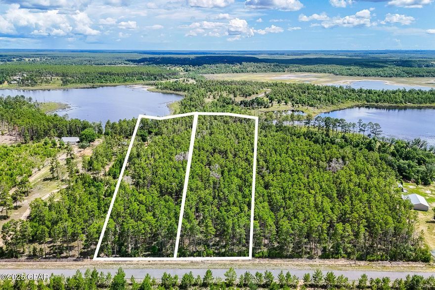 Escape to a quiet and peaceful retreat in the gated community of Long Lake Estates. Priced to sell with a motivated owner, this is a rare chance to secure premium lakefront acreage at an exceptional value. These stunning lakefront properties offer a rare opportunity to build your dream home or a peaceful second residence in a quiet, natural setting.   Offered as one combined parcel totaling 10.52 acres with an impressive 415ft of frontage on beautiful spring-fed Long Lake or two separate lots.  Lot 3 is 5.25 acres with approximately 178 feet of water frontage and Lot 4 is 5.27 acres with approximately 237 feet of water frontage. There are no build-out time requirements, and you can build with minimal restrictions.  Enjoy swimming, boating, fishing, kayaking, paddle boarding or relaxing by the lake in the privacy of your own backyard—Long Lake is exclusive to the community and known for its clear, refreshing waters.  Conveniently located just 35 minutes north of Panama City Beach in the peaceful Greenhead area, this property is easily accessible from Highway 77 and sits close to the community's gated entrance on a paved road. Offering unmatched privacy, natural beauty, and access to endless outdoor recreation, this property is perfect for a weekend escape, full-time residence, or investment opportunity. Don't miss this unique opportunity to own your own slice of lakeside paradise. Buyer should verify all data and dimensions.