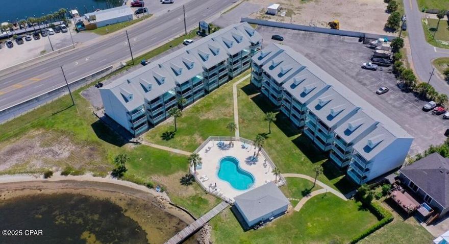 ***BEST PRICED(AS OF LIST DATE) 1 BEDROOM (WITH LOFT) 1 BATHROOM, REMODELED WATERFRONT VIEW CONDO THAT IS WALKING DISTANCE TO THE BEACH IN THE HIGHLY DESIRABLE TREASURE COVE COMPLEX!!!*** As an added bonus the seller is open to a waterfront condo or waterfront lot trade!! This beautiful unit boast breathtaking waterfront views and is less than a 5 minute boat ride to the open gulf. Seller has spared no expense in updating this gem. Upgrades include but are not limited to: New bathroom, lights and ceiling fans, kitchen countertops and stove, closet doors, partial new flooring, and sliding glass doors. Whether as a rental unit investment, vacation home, or a primary residence, I challenge you to find a nicer, better priced condo currently on the market. The complex offers a lagoon front pool and fishing/boat dock. The complex is only minutes away from some of the best restaurants on the beach(Captain Anderson's, Grand Marlin, J Michaels, Dat Cajun Place) and the beach and state park are also walking distance to you. Hurry up and call me before this incredible property gets away!! All information is approximate and should be verified by buyers if important