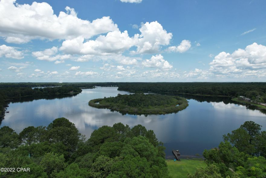 Perfect spot for a site built or manufactured home. Nice wooded lot is conveniently located within 3 miles of town for shopping. There is a public boat launch at the end of Bell drive. Bring your Boat! With ownership you'll have access to Kings Lake.