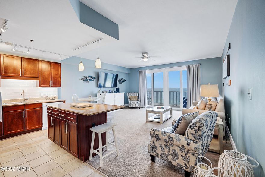 Here's your opportunity to own one of the best views in Laketown Wharf! Located on the 19th-floor, and the far southeast side of the building. Enjoy amazing gulf views from the living room and balcony and also stunning lake views and the heart of Panama City Beach from the primary bedroom. Inside this condo you will find truly unique upgrades you don't often find in other units such as, LUTRON wireless light switches and kitchen lighting upgrades with back-splash. Primary bedroom accent wall and very memorable 1 of a kind unit specific decorations. This 1 Bedroom / 2 Bathrooms with bunk bed room and murphy bed in the living room. Unit has 9ft Ceilings, 1,047 sqft., and comes fully furnished, turn-key, and rental ready. Seller has recently replaced the water heater. Resort-life with awesome restaurants, including Juan Taco, the best taqueria in PCB, The Wharf famous Buffett, Pizzeria, and many more shops on the ground level along with the 52,000 sqft. of lakefront Boardwalk and a nightly fountain & light show. Reasonable HOA fees that include water, sewer, cable/TV, pest control plus amenities such as dedicated gated beach access, 5 community pools (1 heated year-round), kids Playground, hot tubs, mini-golf, Splash Bar & Grill, fitness center with gulf views, 2 covered parking garages. All information and HOA Fees are deemed correct, buyers should verify if they are important.