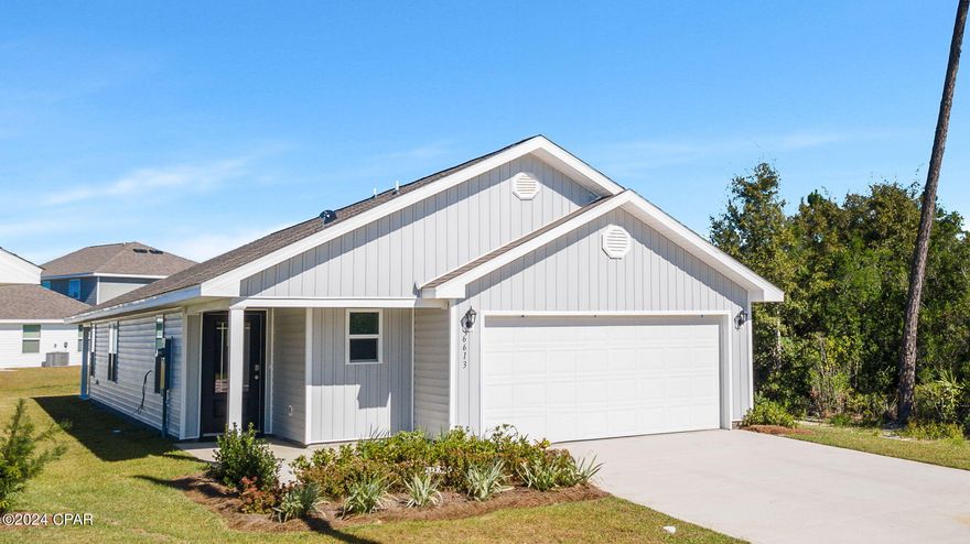 New Construction home in Liberty featuring the Jemison floor plan. This move in ready home is located on a cul-de-sac at 6613 Canley Court. This is a 3-bedroom, 2-bathroom home that is designed to optimize living space with an open concept kitchen overlooking the versatile family room. The well-appointed kitchen features an island with bar seating, oversized pantry and sleek stainless-steel appliances! Bedroom one is located at the rear of the home for privacy and has an ensuite bathroom with double vanity and spacious closet providing substantial storage space. A second bedroom and bath are located at the front of the home. Just off the kitchen the versatile third bedroom, perfect to meet your needs. Like all homes in Liberty, the Jemison includes a Home is Connected smart home technology package which allows you to control your home with your smart device while near or away. Liberty neighborhood is conveniently located in beautiful Panama City off Star Avenue near 231. Located just 25 minutes from Tyndall Airforce Base, 20 minutes to hospitals, and less than 15 minutes to shopping, restaurants, and grocery stores you will be amazed at the convenience once you enter the winding entrance to this beautiful sanctuary. Liberty offers a 7,500 square foot community center with full gym, wellness rooms and much more. Additionally, behind the community center is a water wonderland with resort style pool, splash pads, and an outdoor grilling kitchen with seating