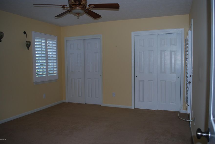 This home is located in the Seaclusion Beach Subdivision which has access to the Bid-A-Wee Dedicated Beach. There is very little through traffic on this street where your family can enjoy quite living a few blocks away from the Gulf Beach. The home features a split bedroom style with the master bedroom featuring 2 double closets and a door to the covered, screened porch in the private back yard. Master bath features 2 vanities with separate shower and Jacuzzi garden tub. The entrance foyer opens into the spacious family room that has plenty of windows to let in light. The kitchen features dishwasher, stove, microwave, refrigerator and has a bar that can serve 4. There is a spacious dining area where the whole family may sit an enjoy a meal.The floors are carpet with ceramic tile in More...