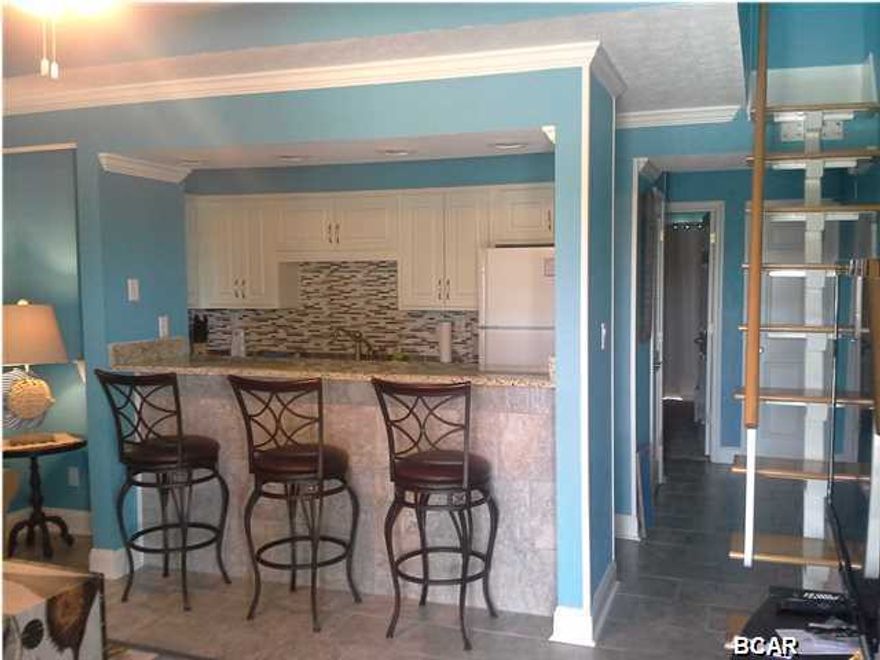 A second floor one bedroom with loft in a gulf front complex. Clubhouse, heated pool, and short walk to the beach. Completely remodeled.