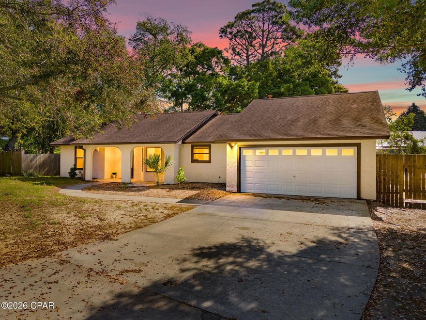 OPEN HOUSE SUNDAY APRIL 19TH FROM 1-3 PM. 
Discover your perfect beachside retreat in Panama City Beach! This beautiful pool home is ideally located just minutes from the World's most beautiful beaches, where sugar-white sand and emerald-green waters await.  Enjoy effortless access to St. Andrews State Park for world-class snorkeling, fishing, boating, camping or hiking on pristine nature trails. Military families will love the short commute to the nearby Navy base, while investors will appreciate the strong short-term rental potential in this high-demand tourist destination. Just a quick drive from popular attractions like Pier Park, Ripley's, Wonder Works and countless dining and entertainment options, this home offers the ultimate blend of relaxation and convenience.

This 3-bedroom, 2-bath split-plan home does not require flood insurance and has no HOA, giving you maximum freedom and lower costs. Recent updates include fresh paint, new carpeting, and a new laundry room addition. The home sits back from the street, providing a spacious driveway for plenty of parking and added privacy.
Step inside to a welcoming open-concept layout featuring a large great room with vaulted ceilings, a corner fireplace, and sliding doors that open to the Florida room. The adjoining kitchen offers a spacious wrap-around counter, cooktop with new microwave, built-in oven, three-basin porcelain sink with disposal and a convenient breakfast/dining area. Ceramic tile flows through the common areas, while the bedrooms feature new wall-to-wall carpet (in two) and laminate flooring (in the front bedroom). The oversized master suite boasts a vaulted ceiling, new carpeting, dual walk-in closets, and direct access to the Florida room. The master bath connects to the brand-new laundry room (with stylish barn door) and offers pass-through access to the pool area. Two additional bedrooms and a full bath with acrylic tub/shower combo complete the split-plan design -- ideal for families or guests.
The highlight? The screened 12x30 Florida room overlooks your private, in-ground full-sized Gunite saltwater pool (recently refinished) and surrounded by a concrete deck. A wood privacy fence, a yard building, and plenty of space for outdoor entertaining or relaxation finish the backyard space. 
Additional recent upgrades include a new septic drain field, a two-year-old water heater, and a 6-year-old dimensional shingle roof -- giving you peace of mind for years to come. The home also has a paid transferrable pest inspection and home warranty in effect. 
Whether you're seeking a permanent residence, a seasonal vacation home, or a high-potential short-term rental investment in this strong tourist market, this move-in-ready pool home delivers comfort, convenience, and excellent income potential.
Ready to experience Florida coastal living at its best? Contact today to schedule a private showing!