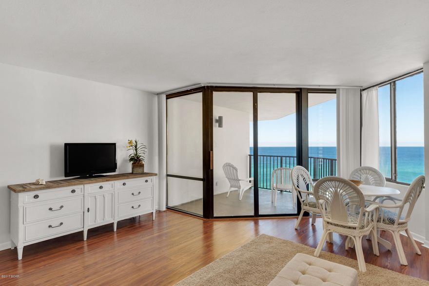 Enjoy incredible views from the PENTHOUSE level on the 12th floor at Sunbird Condominiums. One bedroom/one bath with new flooring, ceilings, wall color and a custom made seagrass rug for the entry/hallway, along with an overhead hallway storage for fishing rods, surf boards and more! This property is only a few steps to the sugary white sands of Panama City Beach and all the amenities this gated condo complex has to offer! Conveniently located near shopping, dining and entertainment - ideal for an investment opportunity or vacation getaway! Has been used as a personal secondary residence so it's in great shape - won't last long! Some artwork and furnishings don't convey with purchase - please verify if important.