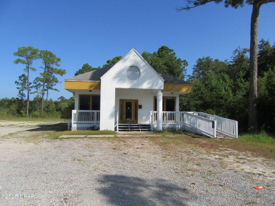 Superior location in booming Panama City Beach. This property boasts ~125' of frontage on Panama City Beach Parkway. Including almost an entire acre of land there are many potential uses. Property has been used as a beauty shop and car sales lot in the past.