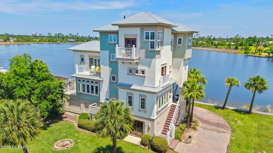 CURRENTLY UNDER CONTRACT, SELLER ACCEPTING BACKUP OFFERS

Must see in person to appreciate all that this home has to offer.

Time has come for the sellers to downsize.  Stunning upscale and secluded Bay front home situated at the end of the gated East Bay Preserve community, surrounded by water on 3 sides, with no immediate neighbors, this home is your own private retreat. Home has panoramic water views and several outdoor decks and balconies to enjoy look at the water and watching wildlife. Largest lot in East Bay Preserve you have your own private dock and 1 additional boat slip in the community marina. Main bedroom is on the 4th floor, 3 additional bedrooms on the 3rd floor. All have connecting bathrooms. Large closets. Attention to detail was not overlooked in the design of this home.