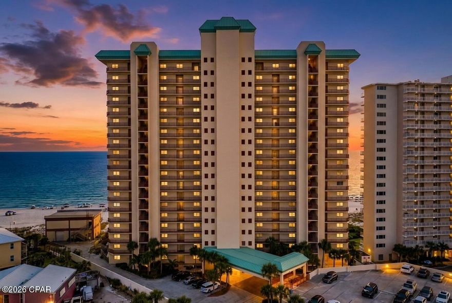 Rare opportunity to own a fully renovated & fully Furnished Gulf-front FIRST-FLOOR residence with PRIVATE BEACH ACCESS FROM YOUR BALCONY and a deeded covered parking space just steps from the front door. NO STAIRS, NO WAITING ON ELEVATIORS and short term rentals allowed. This unit is also the only first-floor handicap accessible unit available for sale in all of Panama City Beach. Watch breathtaking sunsets from your 328 sq. ft. private balcony, complete with its own hot tub and grill overlooking the emerald waters. This one-of-a-kind home offers unmatched convenience and luxury with direct, gated access from your back patio to the pool deck and beach walkover.

The property has been fully renovated with exceptional craftsmanship and high-end finishes. A formal foyer sets the tone with pecky cypress ceiling detail and shiplap accents. Tile flooring flows seamlessly throughout, combining durability with coastal elegance. Two spacious guest bedrooms are located off the entry—one with a private ensuite featuring quartz countertops and a tiled shower, and the other with a full bath shared with the main living area that includes a tiled shower and quartz vanity. Crown molding and new baseboards throughout complete the timeless coastal design.

The open living and dining areas are defined by wall-to-wall windows stretching the entire length of the living space, filling the home with natural light and showcasing panoramic Gulf views. The dining wall is accented with shiplap, while the living room features a custom bookcase surrounding the electric fireplace. The kitchen is a true centerpiece with pecky cypress ceiling accents, floor-to-ceiling cabinetry, quartz countertops and backsplash, a farmhouse sink, stainless-steel appliances, a pull-out trash, and a pantry-style end cabinet for additional storage.

The Gulf-facing master suite is generously sized, with sliding glass doors opening directly to the oversized balcony. The master bath is a luxurious retreat offering dual quartz vanities, custom cabinetry, a spacious tiled shower with two shower heads, and a freestanding soaking tub. The laundry room continues the thoughtful design with quartz counters, floor-to-ceiling cabinetry, abundant storage, and space for a side-by-side washer and dryer.

The private balcony is an outdoor haven featuring a hot tub, grill, and a gated walkout directly to the pool and beach—making it one of the most unique Gulf-front setups available. Community amenities include a guarded security gate, resort-style pool and hot tub, fitness center, and outdoor gathering spaces.

With abundant storage and closet space throughout, this residence is ideal as a full-time home, second home, or short-term rental investment. Tucked along the emerald waters of Panama City Beach, this hidden gem has been meticulously maintained and has not been rented since its complete renovation.

Air handler 3yrs old. Condensing unit 5yrs old

All sizes are approximate, please verify if important