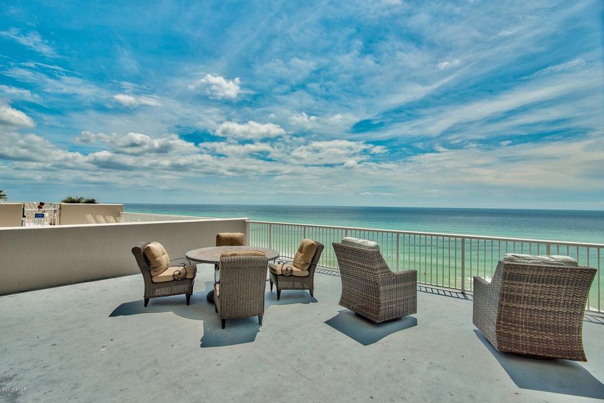 This 2-BR, 2BA condo boasts spectacular, panoramic beach and Gulf views, along with an impressive rental track record and a huge outdoor space. The home is on the first floor of the condominiums, which is the fifth floor, since the first four floors comprise cool, convenient, covered parking. A charming pool, hot tub, complimentary beach service in season and fitness facility contribute to the appeal of the Palazzo low density complex. The kitchen's granite countertops, mahogany color cabinets and black appliances exude elegance, while the breakfast counter opens to the dining area and living room. In turn, the living room opens to the ultra-expansive deck from which you can soak in the sunshine and enjoy unobstructed views to the horizon. Perfect for entertaining and lounging, this balcony's 800-plus square feet exceeds expectations.

The master bedroom also opens to this magnificent deck. A guest room and bunk room share a second full bathroom. The entire condo has an open, spacious feel with white walls and 12-foot ceilings, affording generous air circulation. Ceiling fans, recessed lighting, nice window treatments and tile floors give the condo a comfortable atmosphere for a full-time residence, vacation home and/or high demand rental unit.