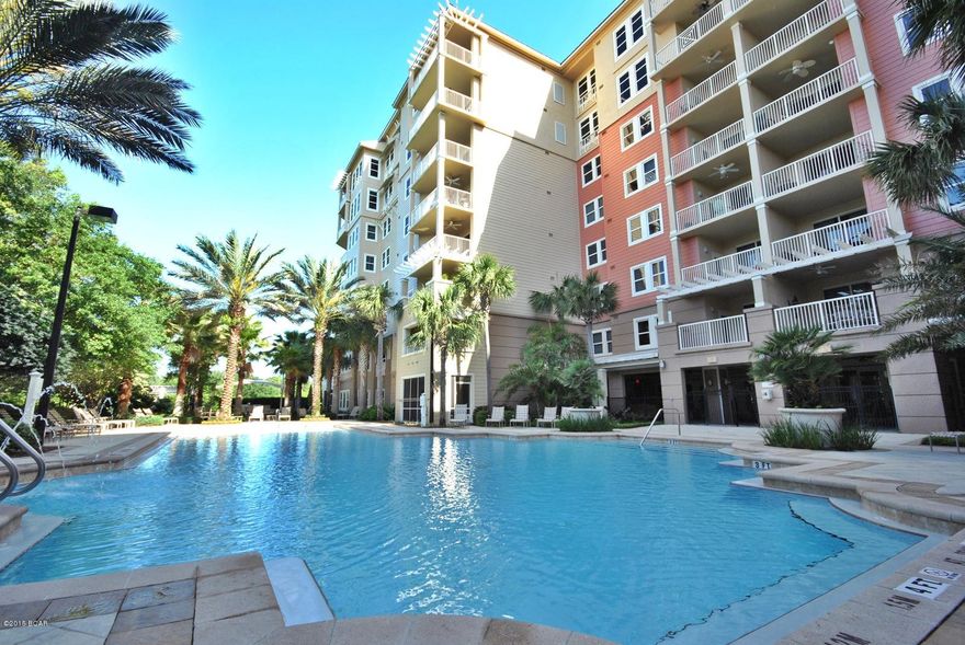 This 2nd floor unit overlooks St. Andrews Bay, Grand Lagoon and a pool and garden area. This 2BR/2BA condo has an office/bonus room, which could easily double as another bedroom. This unitincludes an assigned parking space. This is a move-in ready unit and you'll love the onsite amenities including a private pool, jacuzzi, fitness center, and a covered rec area with fireplace. Bay point is not only  home to two world-class championship golf courses, there is also a full-service marina with boat launch, a spa, and several restaurants. Call today to make Offer.