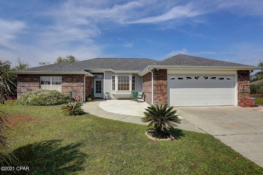 This well maintained home is Priced To Sell! Located on a 1/2 Acre Lot, conveniently located at the end of a cul-de-sac and near a public boat ramp! This home features  4 spacious bedrooms, 2 full baths, large Living room with fireplace & door leading to the screened in porch and large backyard. The kitchen has white cabinets & comes complete with all appliance & breakfast area. There is also a separate Formal Dining Room. The Laundry room has a storage shelf & comes complete with washer & dryer. The Master Suite has a Large Private bathroom with double vanity sinks, Tub/shower combo & walk-in closet. This spacious 1/2 acre lot features a long driveway for parking in front of the 2 car garage, there is a 2 car aluminum carport, plenty of room for storing boats, RV or extra vehicles.