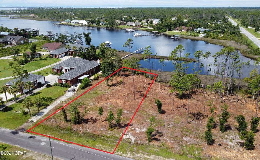 Dockable Waterfront Home site on Mills Ln. 106' on Laird Bayou. Over half an acre! Experience true deep water access with no worries of low tides or low bridges preventing you from the Gulf of Mexico. Enjoy the sparkling waters of East Bay that offers some of the best views and flats fishing in the area. Just a short boat ride to the Gulf. Several Full service marinas close by make fueling up and taking off as easy as possible. Mills lane is a street all to itself that boasts high end waterfront homes. Excellent proximity to Tyndall AFB, Mexico Beach and Panama City Beach. Schedule your visit today!!
