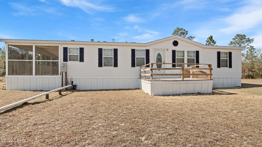 Home on 10 Acres! This beautiful 3 Bedroom 2 Bath Porch Model Double wide features a split floorplan, and large living spaces. The oversized living room and dining room area flows into the galley style kitchen, that continues to the breakfast nook area, and finally outside to the massive screened in porch. The master suite features a large walk-in closet in the bedroom, and walk-in shower with separate garden tub as well as double-vanity. Home features new paint and flooring, and new appliances. Outside, the property features pastureland, partial fencing and cross fencing. and scattered raw land. This is a must see. Schedule your showing today!