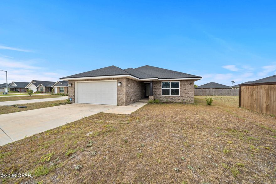 Welcome home to this brand-new listing in the highly sought-after College Station neighborhood of Panama City! This charming three-bedroom, two-bathroom home offers 1,901 square feet of well-designed living space that checks all the boxes for comfortable Florida living.

The split floor plan gives everyone their own space, which is honestly one of the smartest layouts out there. The primary bedroom is a true retreat, featuring a large closet and a double vanity bathroom that makes morning routines a breeze. Vaulted ceilings throughout create an airy, open feel that makes the home live even larger than its generous square footage suggests. Vinyl plank flooring runs through the home, giving you that beautiful look without the fussy maintenance. The kitchen comes equipped with a pantry, because nobody ever complained about having too much storage.

Ceiling fans keep things comfortable alongside the central electric system, and the garage provides covered parking plus extra room for all your stuff. The quality of construction here is evident in every detail, built to handle the Florida lifestyle with ease.

The neighborhood puts you in a fantastic spot with Publix just minutes away for grocery runs, Zollie Young Dog Park nearby for your pets, and North Bay Haven Charter Academy right around the corner. Residents will also appreciate easy access to Mosley High School and even Florida State University Panama City for higher education options.

This one is fresh on the market and ready for its new owners. Schedule your showing today before someone else calls it home! Washer, Dryer, and TV in primary bedroom convey in as-is condition with the sale of this home.