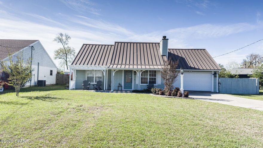 Welcome to the highly desired Forest Park neighborhood! This unique property has a thoughtfully designed 3 bedroom 2 1/2 bathroom home with a Metal  roof and Hardie board siding, a newly renovated workshop shed, and a 12 x 30 pole barn concrete pad with 30 amp power for RV storage, accessed via a farm gate off the driveway. This beautiful home is rich with craftsman features to include custom doorway and archway trim, wainscoting, crown molding, and wall alcoves. As you enter the home, you step into the open living room with high vaulted ceilings. The open stairway leads to the loft and bedroom area. Under the stairs is the hall to the powder room and gorgeous spacious primary suite. Through the living room is the modern kitchen with quartz countertops, a large porcelain farm sink, ample custom maple cabinets, a broad island with bar seating, a walk-in pantry, Whirlpool Gold stainless appliances, and new LED recessed lights. Off the kitchen is a dining room and den area that leads to the backyard, as well as the laundry room which leads to the garage. The downstairs primary bedroom has a tray ceiling and two closets, one of which is a large walk-in with built-in shelving. There is also a deep linen closet just outside of the primary bathroom. This bathroom has a large walk-in tiled shower with rainfall and handheld showerheads, two quartz-top vanities with new mirrors and individual built-in medicine cabinets, and a separate toilet closet with extra shelved storage space. There is also an exit to the backyard, which is excellent restroom access for backyard entertaining or shower access following yardwork or returning from the beach. The powder bathroom was remodeled in 2025 with a new vanity, quartz vanity top, lighting, mirror, and brushed nickel fixtures. The entire lower level has hand-scraped wood-look ceramic tile, except for the primary bathroom, which has marble look ceramic tile to match the shower surround tile. Upstairs, you will find the other primary style bedroom with an en suite bathroom and two closets, as well as the open loft bedroom, which has built-in wall shelving, a closet, and enough room for a queen bed and desk or a nice office set up. The upstairs en suite bathroom has plenty of cabinetry for storage and linens, a new mirror, new vanity light, and new brushed nickel fixtures, and a tiled walk-in shower with a built-in bench and niche.
The workshop shed has new steel siding and roofing, a new door with a pin code deadbolt, new foam board insulation, new portable air-conditioning unit and ceiling fan, overhead lumber storage, 2 work tables, and electric power with its own breaker panel. The pole barn with concrete pad has a very high metal roof cover to house most RVs, boats, or other recreational vehicles. The pad has Georgia granite rock borders on the fence side and back to keep weed growth down and provide excellent drainage to the city easement behind the privacy fence. The home has solar panels on two roof surfaces (which are not visible from the street) to keep electric costs low. There are hurricane shutters, gutters, and a freshly painted pergola and covered porch in front to relax and enjoy your maintenance free quiet cul-de-sac home. This is a must-see property!