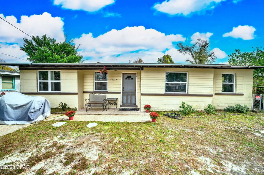 CURRENTLY UNDER CONTRACT, SELLER WILL CONSIDER BACKUP OFFERS || **Motivated Seller!** Charming 4/2 in Oakland Terrace that is convenient to St. Andrews, historic downtown and minutes to the beaches and shopping.  Completely renovated after Hurricane Michael to include a new roof, AC, kitchen cabinets/granite countertops, new flooring and more.  Enjoy the fabulous and spacious fenced back yard year round. There is even enough room for a pool! A new, large shed for storage comes complete with hurricane clips in the roof.  The large screened in porch is perfect for entertaining or quiet evenings.  There is a termite bond that transfers.  
**Washer and dryer do not convey. The freezer and both extra refrigerators do not convey.
**Insurance is $1400/year. Policy is with Goosehead-Paul Wunstell.