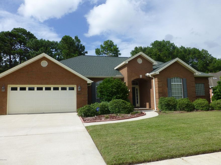 The floor plan in this  outstanding executive home in The Landings has that perfect mix of formal and informal living area and is designed for busy life styles. You will appreciate the easy care hard wood and tile flooring throughout this home, which are perfect for kids, pet and folks with allergies. Arched doorways and windows, rounded corners, trey ceilings, crown moldings etc add pleasing architectural touches. The private back yard backs up to a wooded conservation area and there is plenty of room to add a pool. The foyer is flanked by an office that could also serve as a 4th bedroom and a welcoming  dining room. French doors open from the cozy den to a covered patio.  A turn of the corner leads  to the main living area with gourmet kitchen,comfy family room and casual breakfast area. The kitchen features a walk-in pantry, center  island with breakfast bar, stainless steel appliances and Corian counter tops. There is lots of cabinet space and a commercial style gas range with double convection oven will appeal to the casual cook and also delight the serious chef.The family room is the central hub where everyone likes to gather and from there a hallway leads to 2 spacious bedrooms which are connected by a Jack & Jill bath. The large master bedroom on the opposite side of the house is a private retreat with an adjoining 10'x11' sitting room and access to a covered patio. The master bath offers all the little luxuries such as dual vanities, whirlpool tub, separate shower, linen closet and 6'x10' walk-in closet.Call for your private showing today!  Don't let this one get away!