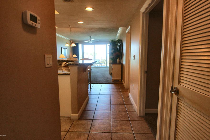 The best aspects of Florida living come together in this exceptional 2 bedroom, 2 bath coastal condominium at the Boardwalk Beach Resort! Fully furnished and rental equipped !!! Interior highlights include crown molding, high breakfast bar, plenty of granite counters and cabinetry, large kitchen dome light for great lighting, and six panel doors. The master suite has an oversized bedroom with balcony access and gulf and beach views from 2-sides. The master walk-in closet is larger than some bunk rooms and has a floor safe for storing your valuables and also has a bonus closet in the master. Even the guest room has two closets so there is plenty of storage space. . Resort style amenities include a 2,500 sf zero entry pool (seasonally heated), two spas, Gulf front fitness facility, lavish po pool deck, Splash Zone children's pool area with interactive water toys, Kids Club, sauna, steam room, massage therapy, covered parking, 24 hour reservation desk and Island Breeze corner market featuring sundry shop, pizza, ice cream and much more!