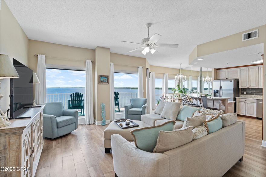 **BOAT SLIP INCLUDED** On the 6th floor of Marina Bay - Lynn Haven's top waterfront community - this fully furnished bayfront retreat gives you amazing views of North Bay and the marina from the moment you walk in. Everything's ready to go - you can move in and start enjoying life on the water right away.

The open living and dining area is bright and roomy, flowing right out to a big balcony where you can enjoy your morning coffee, watch the sunset, or hang out with family and friends. The kitchen has modern appliances, plenty of cabinets, and a layout that makes cooking or hosting easy. The master suite is your own private getaway, with balcony access, big bay views, a walk-in closet, and a spa-style bathroom with double sinks, a soaking tub, and separate shower. An additional bedroom with its own en-suite bath—also accessible from the hallway—offers comfort and convenience for family or guests.

A covered boat slip with a lift is available for purchase, so you can hit the water anytime. Marina Bay is a gated community with great amenities: a bayfront pool, fitness center, clubhouse, and an on-site marina (separate HOA). You get a quiet waterfront spot, but you're still close to shopping, restaurants, schools, and just a short drive to Panama City Beach and the gulf. The unit comes with its own covered parking space for added convenience.

Rental restrictions keep the community peaceful, private, and safe, with no constant turnover. Add in an unbeatable location, jaw-dropping views, and a move-in ready setup, and this unit has everything you need to start enjoying waterfront life immediately. Whether you're looking for a full-time home or a vacation getaway, come see this bayfront retreat for yourself.