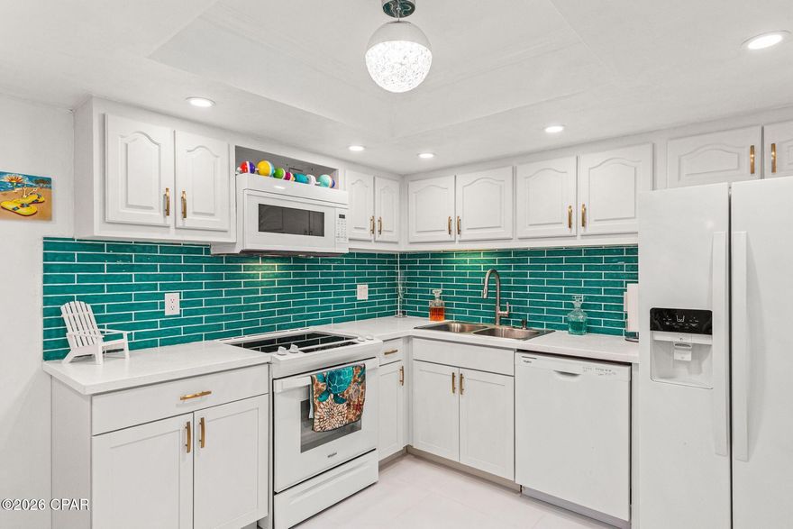 This newly remodeled two-bedroom, two-and-a-half-bathroom unit offers expansive double Gulf front views. The interior has been updated with all new appliances and tile flooring throughout. The downstairs ceilings have been smoothed, and the kitchen ceiling has been raised, featuring canned lighting and a new tile backsplash for a modern touch.
On the lower level, you can enjoy views of the Tower's indoor/outdoor pool as well as the beach and Gulf to the west, providing spectacular sunsets. The master bedroom boasts a beautiful Gulf view, which can be enjoyed from its private balcony.
The unit comes fully furnished, with a colorful and beach-inspired décor that enhances its vibrant coastal ambiance.
Pinnacle Port is a gated community with its own boat ramp and boat docks leading out to pristine Lake Powell (the State of Florida's largest coastal dune lake), bocce ball, pickle ball, shuffleboard, tennis courts, basketball court, grills on each end of the property and two pools. Pinnacle Port is a short distance to dining and shopping on 30A and at Pier Park. At Pinnacle Port, you have the best of both worlds. Conveniently located 2.4 miles (4 minute drive) from 30A, yet still 8 miles (14 minute drive) to Pier Park!