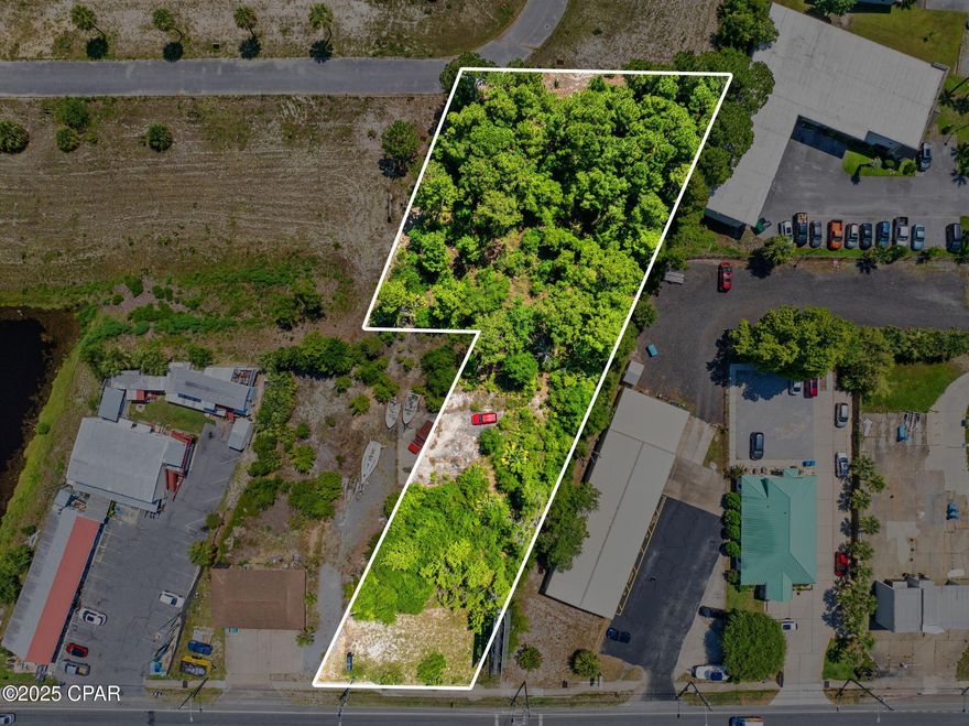 Rare Commercial Opportunity on Thomas Drive - 1 Acre in Panama City Beach!

Now's the time to lock in a valuable piece of PCB's booming future. Located in one of the highest-traffic corridors of Panama City Beach, this 1-acre commercial parcel at 1735 Thomas Drive offers unmatched visibility, accessibility, and development potential. Zoned commercial and surrounded by established businesses, this prime property is ideally positioned just minutes from the beach, the Navy Base, and Grand Lagoon.

With approximately 100 feet of road frontage on Thomas Drive, this site delivers excellent exposure to daily commuters, beachgoers, and year-round visitors. Whether you're a developer aiming to establish a retail strip, restaurant, or office complex—or an investor seeking prime land in a rapidly growing market—this is your opportunity to secure a strategic stake in Panama City Beach's continued growth.

Opportunities like this are few and far between. Don't miss your chance to build something remarkable in one of the Gulf Coast's most dynamic corridors. Call today and turn possibility into progress!