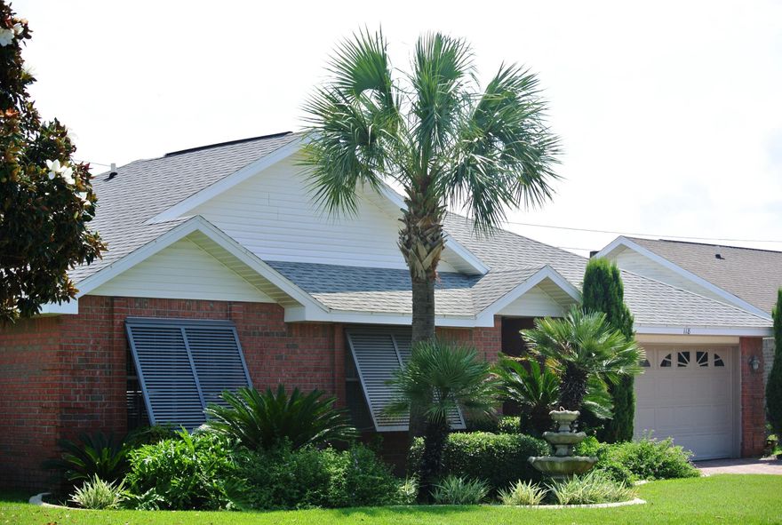 Saltwater Pool & Privacy Fence - Florida Room with Heat & Air - Double Garage - Generator Hookup - New Well Pump for Watering - Water Softener - Sunroom - New Fire Pit - New Light Fixtures - New Kitchen Backsplash - ''Life Breath'' Filter System - Hurricane Rated Bahama Shutters - Elite Pavers in Driveway - Brick Exterior One Level Home - Warranted A/C motor replaced 3 years ago -