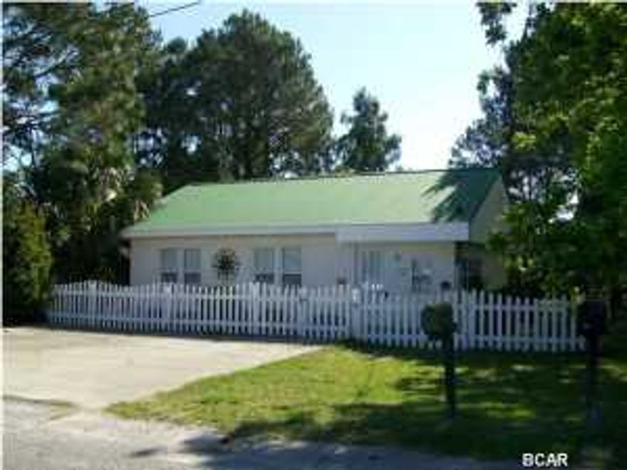 Adorable old Florida beach cottage has been remodeled- all you need to bring is your bathing suit. The home has 3 bedrooms and 2 bathrooms and is sold fully furnished. The kitchen has been remodeled to include new stainless appliances, granite counters, and tile floors. The home features beautifully stained beam ceilings. The 3rd bedroom could also be used as a Florida room, bonus room, or office. There is a screened in back porch with room for out door dining and sitting area, stone pavers deck with additional room for dining or relaxing,an outdoor shower, yard building,and sprinkler system on a well. The home has a metal roof and the large 50x110 lot is fully fenced. All this plus the home is only two tenths of a mile to the World's Most Beautiful Beaches. Age, sq. footage, and