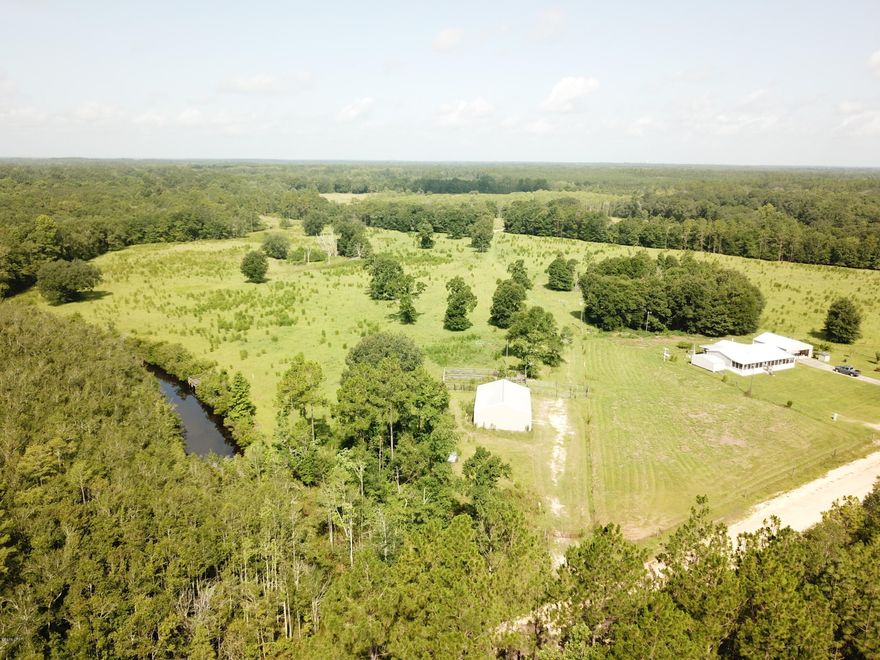 N Holmes County Horse and/or Cattle Farm for sale! 130 acres- pastureland - fenced and cross fenced. 3 ponds! 3bed/2bath Triplewide mobile home - 1998 Clayton Homes model. 2 barns - one barn can service as a detached garage - the other can be used for equipment or livestock. Lots of potential with this property. Metal roof - New HVAC - 2 wells on the property. The farm has road frontage on each side of Coates Rd and Pine Ridge Road. Owner has a cattle lane running through the heart of the farm. Bring the horses! Mobile home features two living areas - large master suite - Huge screened in frontage porch and a back porch deck. Emergency generator Shown by appointment only!



CURRENTLY UNDER CONTRACT, SELLER ACCEPTING BACKUP OFFERS
