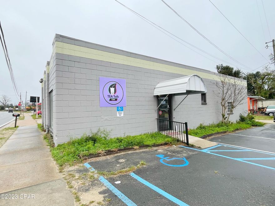 Ready For Business!  This commercial building in a prime location in Marianna is ready for a small restaurant or retail type business.   It has a new roof, new paint, some restaurant equipment. Approximately 1900 sq ft in the front of the building and 616 sq ft in the back ideal for storage.  Parking on the side and back and enough room for a drive thru if needed.