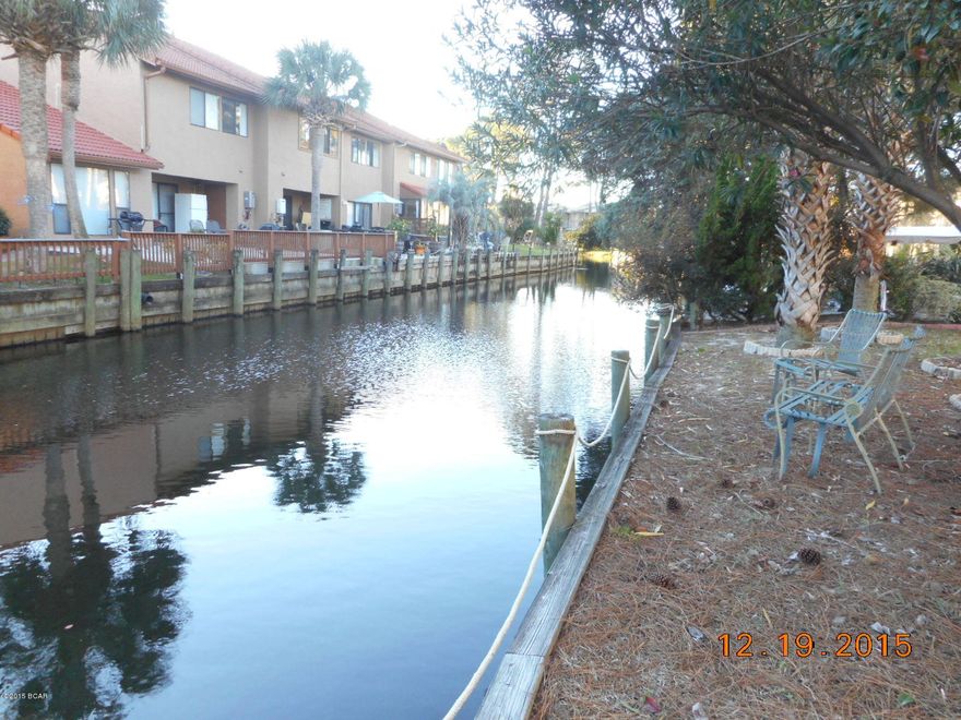 Walk to the white sandy beach from this updated town home in Gulf Highlands. Updates include new kitchen cabinets and appliances, tankless water heater, tiled floors, NEW ROOF, new 6 panel interior doors, new storm door. This unit includes an office space or could be a bunk room. This complex has 11 pools, a mini golf course, beach front club house and pool, small fitness room, tennis courts, shuffle board courts and community room. This unit is located on the canal. Measurements are approximate.