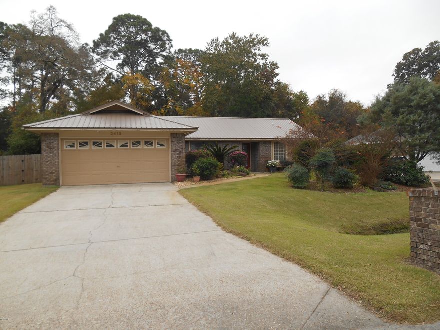 Centrally located home - in great condition - with a pool!!  The KITCHEN was remodeled in 2014.  New cabinets, additional cabinets, granite countertops, granite peninsula and a bay window overlooking the pool and no mow backyard.  GREAT ROOM features beamed ceilings, brick wood-burning fireplace, French doors that lead to a screened-in patio.  The backyard  is a delight filled with fruit trees...blueberry, fig, lime and orange plus eight raised beds for planting herbs and flowers.  A separate shed for all of your garden tools is located in the privacy wooden fenced yard too.  The sprinkler system on a well.  MASTER BEDROOM has raised ceilings and access to the screened patio.  MASTER BATH was remodeled in 2013 with a wheelchair accessible shower.  New A/C compressor & dishwasher in 2017. New hot water heater and chlorination system (for pool) 2016.  New shed and wooden fence in backyard 2015.  New hurricane-rated metal roof 2013.
Solar panels are on roof top on back of home used to heat the swimming pool.  DINING ROOM has a wet bar and a pantry for storage.   Yard has an invisible fence already installed in case you have dogs.  Home is under termite bond with Florida Pest Control.  Washer and dryer convey with sale of home as do all blinds. Freezer in Garage does NOT convey with sale of home.  All measurements, room sizes, square footage approximate.  Please verify if important.