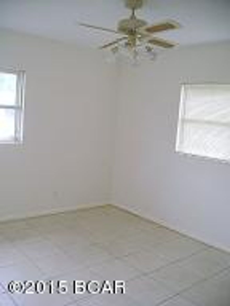 THIS THREE BEDROOM TWO BATH RENTAL HOME HAS AN OPEN FLOOR PLAN. KITCHEN, DINING, AND LIVING ROOM ARE SPACIOUS AND OPEN.LARGE DEN IS ON THE BACK OF THE HOME. TILE FLOORS AND LOTS OF CEILING FANS. THE GREAT ROOM ON THE BACK WITH LOTS OF WINDOWS AND OPENS TO THE FENCED BACKYARD.