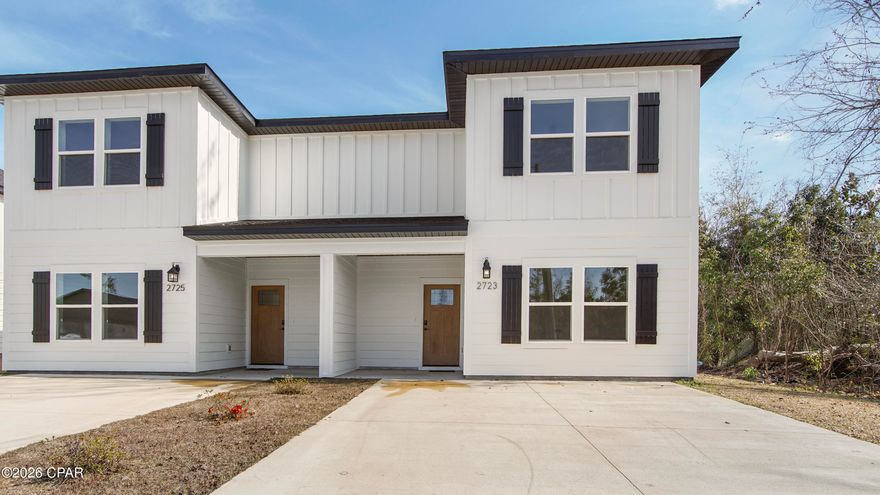Discover the essence of modern luxury living in this newly constructed townhome, ideally located near Highway 231 in Panama City, Florida. This highly desirable property allows short-term rentals, features no HOA, and offers convenient access to local dining, shopping, and is just 18 minutes from Tyndall Air Force Base. The thoughtfully designed main level showcases an open-concept layout that seamlessly connects the kitchen, dining, and living areas, perfect for both everyday living and entertaining. This level also includes a large bedroom, a full bathroom, and ample storage space. Step outside to the covered back porch, an inviting space to enjoy morning coffee or unwind with an evening glass of wine. The kitchen features a large center island, modern white shaker cabinetry, stainless steel appliances, quartz countertops, and sleek black fixtures and hardware. The whole home is finished with consistent luxury vinyl plank flooring, enhancing both durability and style. Upstairs, a split floor plan provides privacy and comfort. The expansive 13'7'' x 15'8'' primary suite serves as a true retreat, complete with a ensuite bathroom offering double vanities, a shower/tub combination, and quartz countertops. A generous walk-in closet completes the primary suite with both functionality and refined design.
Two additional spacious bedrooms with ample closet space share a full bathroom on the upper level. The conveniently located upstairs laundry room adds to the home's practical layout. Exterior features include durable Hardie board siding and a fully sodded yard, Rheem tankless hot water heater, completing this exceptional new construction opportunity.