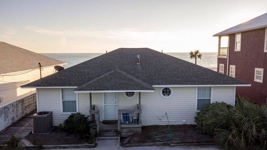 CURRENTLY UNDER CONTRACT, SELLER ACCEPTING BACKUP OFFERS. The ultimate location! This gulf front beach house is three-tenths of a mile from Pier Park and across the street from the well known Dusty's Oyster Bar. The three-bedroom, two bath home boast a large outdoor deck over looking the Gulf of Mexico. Information contained within this listing such as square footage, is deemed to be accurate but is not guaranteed. Buyer to verify.