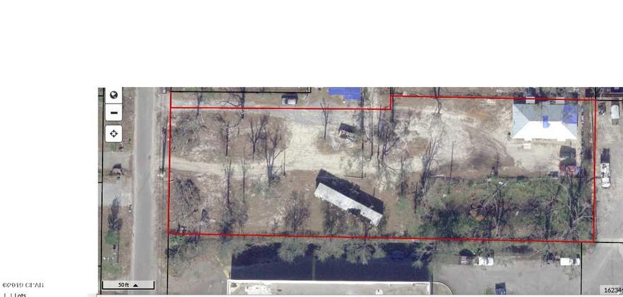 Duplex with $1,100 gross monthly rent on over 1 acre of commercial land right off of Tyndall Parkway, a perfect place for your business! * New Roof June 2019* Each unit rents for $500 per month. Owner pays for W/S/G & street light. Mobile home pays lot rent of $100 monthly. Water/sewer has been as low as $92.00 and as high as $176.00 a month. Usually around $120.00 a month. Garbage is $87.00 a quarter. Street light is $9.17 a month. Current commercial zoning does NOT allow for additional residential units.