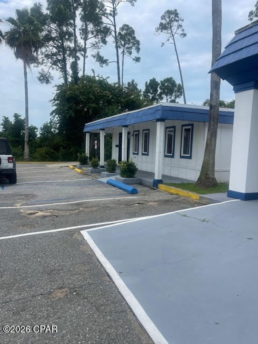 This is a great location across from the Naval Warfare Center on Navy Blvd. This office has new flooring . Rent is $2500 a month. There is also a 2760 Sq foot building for rent next to it  for $5000.00 a month. There is a climate controlled warehouse for rent for $3000.00 a month behind this. Can rent 1 or all three. Great location. Anything you put here would be a money maker.
