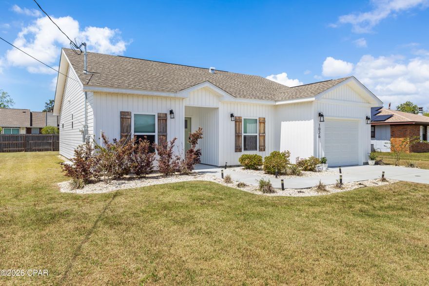 Welcome to your dream home where modern elegance meets effortless Florida living. 
This beautifully crafted 2024-built Craftsman-style residence offers the perfect blend of style, comfort, and functionality in a peaceful setting.

From the moment you arrive, the bright white exterior, charming architectural details, and fresh landscaping create an inviting first impression that feels like home.

Step inside to discover a light-filled open floor plan designed to maximize every square foot. The spacious living area flows seamlessly into a stunning kitchen featuring:
Sleek white quartz countertops
Upgraded SMART stainless-steel appliances
Abundant cabinetry for storage and style
Under cabinet lighting
ALL appliances convey - including the washer & dryer!
A home security system also conveys including front door camera, glass shatter sensors, interior motion detector, door sensors, direct link smoke alarm - all controlled with the Vivent Smart Home Panel!
Termite bait stations surround the home for peace of mind.
Elegant tray ceilings in both the living room and primary suite add a touch of sophistication, while durable luxury vinyl plank flooring brings beauty and practicality throughout the home.

The thoughtfully designed layout includes 3 bedrooms and 2 full bathrooms, offering comfortable living for families, guests, or even a home office setup. The primary suite provides a relaxing retreat with generous space, huge walk-in closet and refined finishes.

Outside, enjoy a covered entry and a  patio area out back - perfect for morning coffee or unwinding in the evenings. The comfortably sized lot gives you flexibility and freedom to create your back yard oasis, with plenty of room for a boat, RV, or additional outdoor features - and best of all, no HOA restrictions.

Additional highlights include:
Low-maintenance, energy-efficient new construction
No flood insurance required!
Convenient location just minutes from Tyndall Air Force Base, shopping, dining and schools.

This home delivers the rare combination of modern finishes, smart design, and everyday convenience - all wrapped into one MOVE-IN READY package!