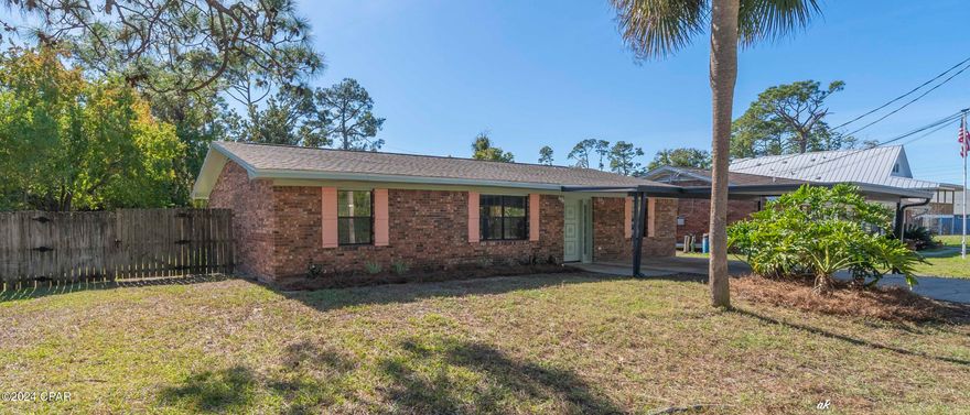 TREASURE COVE PH 2 ... CURRENTLY UNDER CONTRACT TAKING BACKUP OFFERS.   just 1.8 miles to Access 2 at Panama City Beach, Fl pn beautiful Gulf of Mexico.  Excellent location ... 2 blks to grocery shopping and just a short distance to dining, entertainment, shopping, etc. Brick home 3 BR 2 bath with additional bonus room that has washer/dryer hookup. This room is large enough to use as 4th BR, office, craft room, etc.  Home has recently been completely redone to ''new'' inside.  Recent upgrades as follows:   newly painted in and outside, doors, wide baseboards, closet shelving and BR ceiling fans. New roof 2019, new flooring throughout.  New bathroom vanities, mirrors, lighting and toilets.  Kitchen has soft close cabinets, quartz counter tops and tile backsplash. HVAC manufactured in 2011 ... serviced regularly once each year. All new screening in screened room across back of house.   Lovely fenced in back yard. 
 A bonus is the large storage room ... great area to keep lawn mower, etc.  Photos attached.  This one is a rare find ... call today for a private showing!