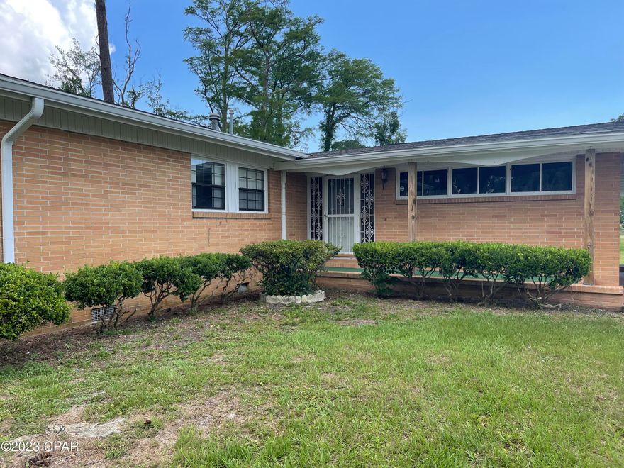 CURRENTLY UNDER CONTRACT, SELLER WILL CONSIDER BACKUP OFFERS. 
Welcome to this unique property offering a brick home on a spacious 1.03 acre corner lot. Located on a desirable street, this property presents an excellent opportunity for those seeking a renovation project or an investment venture. With 3 bedrooms, 2.5 bathrooms, and an array of versatile spaces, this home offers the perfect canvas to create your dream residence or explore various development possibilities. Upon arrival, you'll appreciate the classic brick exterior. The home sits on a corner lot, providing added privacy and potential for expansion. The large carport offers convenient covered parking for multiple vehicles.
Step inside and envision the possibilities. The main living area boasts a formal living room, providing an elegant space for entertaining guests or enjoying quiet evenings with family. One of the standout features of this property is the additional space, ideal for a utility room, storage or office. This space includes a convenient half bathroom, adding to its functionality. Let your imagination run wild as you explore the possibilities of transforming this area to suit your unique needs. The location of this property is truly one-of-a-kind. Directly behind the home, you'll find Forest Park South, ensuring a serene and unobstructed backdrop for your daily activities. Enjoy the tranquility of having no neighbors behind you as well as a playground.  While the home requires considerable work, its potential is evident. Renovate and personalize the existing structure to create your ideal primary residence, taking advantage of the large lot and desirable location. Alternatively, explore the option of subdividing the lot and selling off portions or developing additional homes—a fantastic opportunity for investors or developers looking to maximize the property's potential. Don't miss out on this exceptional property that offers versatility, privacy, and a world of possibilities. Whether you're looking for a renovation project, an investment opportunity, or a blank canvas to create your dream home, this property delivers on all fronts. Schedule your private viewing today.