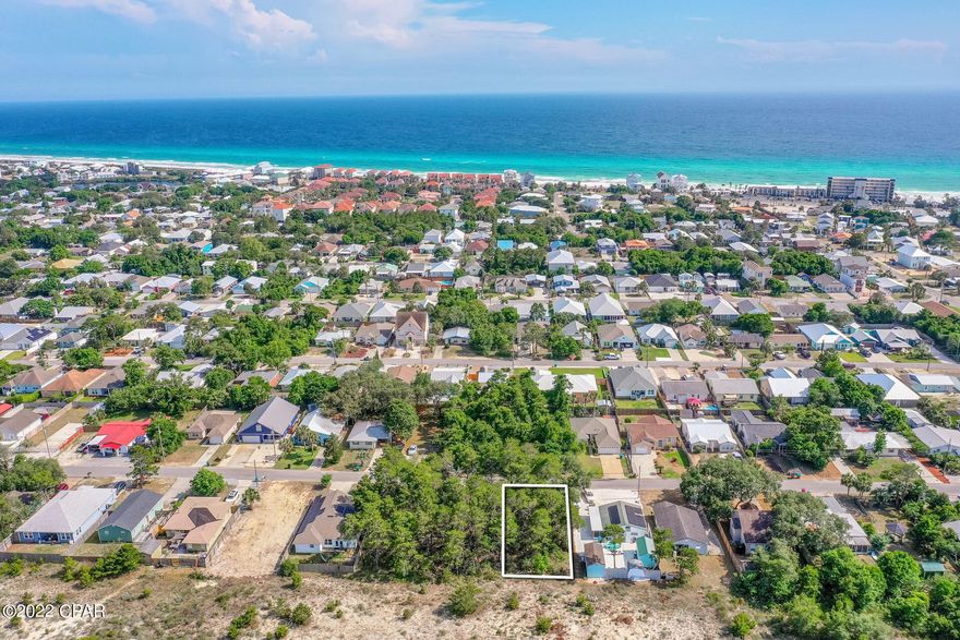 Just 4 Blocks to the public beach access. Located on the South side of HWY 98 and on the West end of Panama City Beach. Build a dream beach house that is a short distance to the public beach access. No HOA's and flood zone X. Amenities are within minutes, such as Pier Park and future developments being built around. Great potential for an investment as well. Sewer hook-up available. Roughly 50x105 buyer to verify.