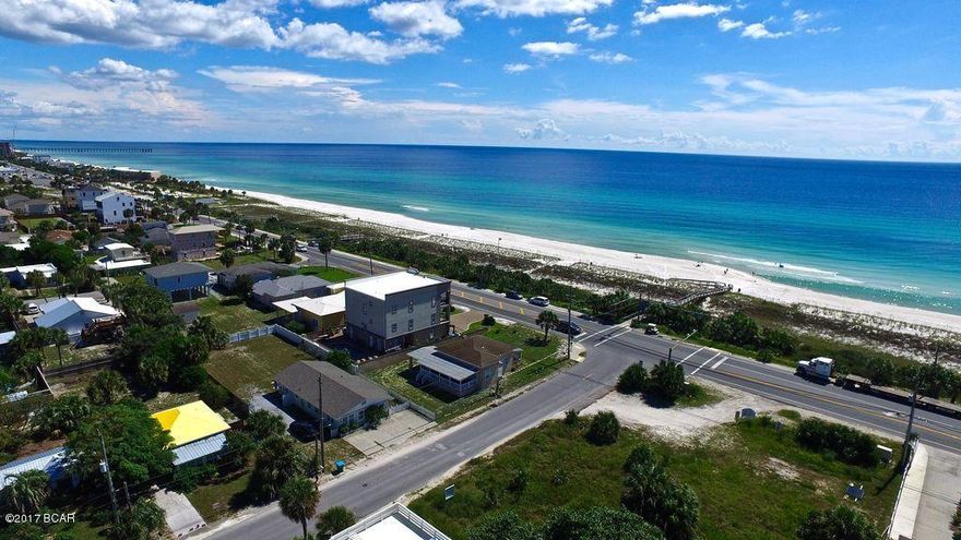 Prime building lot located in popular Bid-A-Wee subdivison. Lot is cleared, filled, surveyed and ready to build. just footsteps away from the most beautiful beaches.  Dedicated beach with public assess just 100 foot away.
