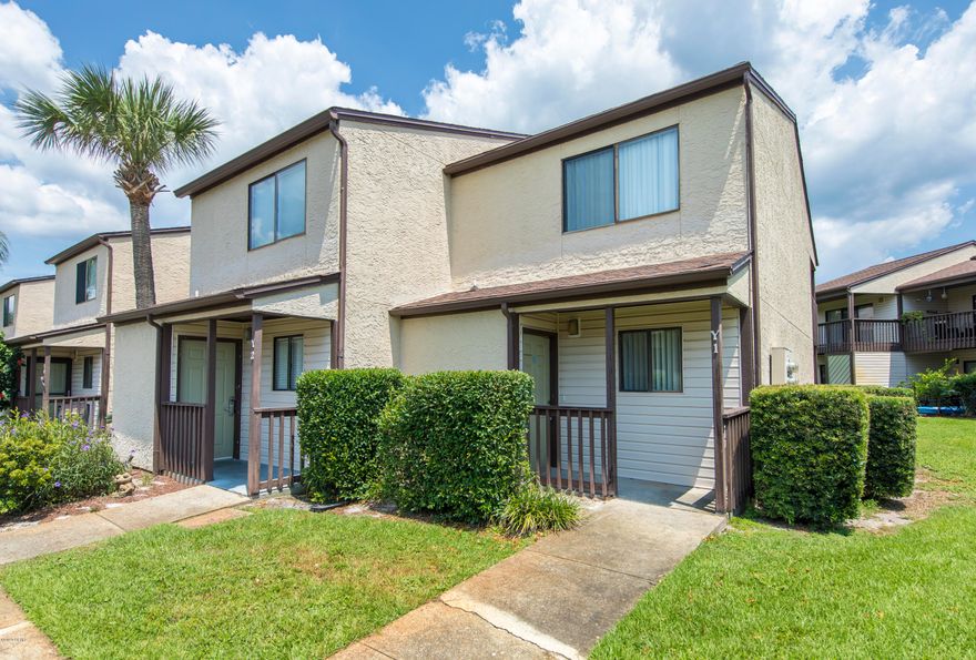 'CURRENTLY UNDER CONTRACT, SELLER ACCEPTING BACKUP OFFERS' Pack your bags and head here for the weekends, put on the rental program or just MOVE to the BEACH full-time!! This condominium has 2 pools, tennis courts, a community room and a public access to the BEACH just across front beach road. The sky is the limit with this unit. Make it your canvas and decorate it the way you want to! This unit is priced to sell offering 2 bedrooms, 1.5 baths. Open Family room and dining room adjacent to the kitchen. Pantry, Laundry room and 1/2 bath are located downstairs with a back porch and storage room just outside the family room. A Covered porch for those afternoon sunsets! Located upstairs is the master suite that has a covered balcony, with an additional vanity and access to the bathroom as well You are only 2.4 miles to Pier Park, the fishing pier and the dog park! Lot's of entertainment, restaurants and shopping nearby! Don't miss out on owning a piece of BEACH! Check this unit out today before it's gone!