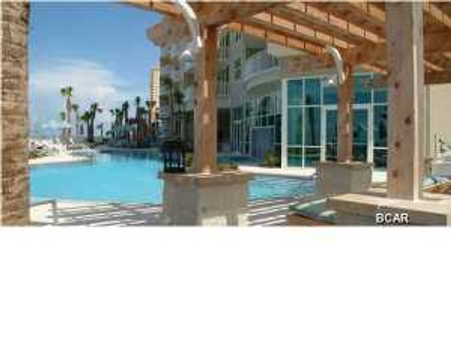 Hosting unprecedented Gulf of Mexico views this coveted condominium residence rises above the sand and surf of Panama City's best stretch of white sand beach, not to mention soothing sounds of waves along the shore. Aqua is the premiere destination resort destination in Panama City Beach. This stunning and beautifully appointed condo has two spacious bedrooms double bunk alcove and 2 full bathrooms plus magnificent windows and balcony to take advantage of the unbelievable views and to capture the gorgeous evening sunsets. Enjoy the contemporary beach inspired interiors that make you feel like you are on vacation the minute you open the door including the large gourmet kitchen with sleek stainless steel appliances, warm wood cabinetry and slab granite counters. Experience all of