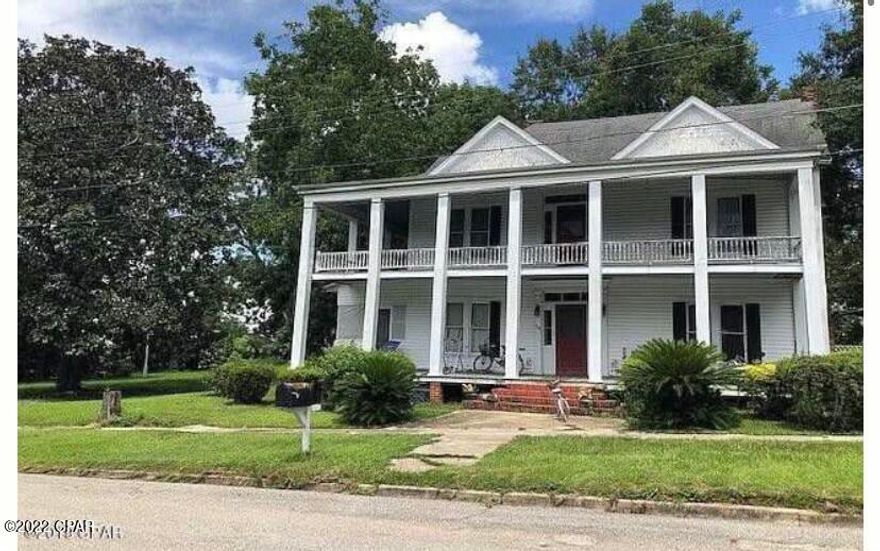 Beautiful 5 bedroom Victorian home built in 1900 This would make a great home for someone looking to live in the Gone with The Wind era. It also would make a great bed and breakfast or Restaurant. Huge corner lot could easily put a parking garage or an amazing garden sitting area with Gazebo. Or even benches throughout a rose garden. So many opportunities here. High Ceilings.. Amazingly large bedrooms.. Yes the house needs work there was an addon utility room that has a roof leak, but no leaks in the main structure that I saw. The original hardwood floors could be sanded and redone. The kitchen needs to be completely redone.