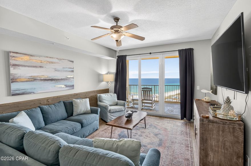 Located in Tower 3 at Calypso - completed in 2021 as the newest gulf-front high-rise resort tower built in Panama City Beach - this 3BR/2BA condo offers a more modern resort experience than many older beach condos, with contemporary coastal finishes, updated amenities, and a fresh, well-maintained feel. Just a short walk to Pier Park, the location puts dining, shopping, entertainment right at your doorstep while still keeping you directly on the beach.

Inside, 9' ceilings and an open-concept layout create a bright coastal living space designed around stunning gulf views. Luxury vinyl plank flooring runs throughout the condo, offering the look of natural wood with the durability and low-maintenance performance ideal for beach living and rental use.

The kitchen, dining, and living areas flow seamlessly together, opening to a wide 10' balcony overlooking the emerald shoreline and Russell-Fields Pier. The kitchen features clean white cabinetry, quartz countertops, stainless steel appliances, and a tiled backsplash, anchored by a shiplap-accented breakfast bar with casual seating. A flexible nook just off the kitchen adds extra function and can serve as additional seating or a casual gathering space.

The primary suite is positioned for privacy and views with direct balcony access, a king bed, and an ensuite bath with quartz counters and a frameless glass walk-in shower. Two additional sleeping areas include a second king bedroom and a bunk room with twin-over-twin beds, plus a queen sleeper sofa in the living area, comfortably accommodating up to 8 guests. A second full bath includes quartz countertops and a shower/tub combination.

Resort amenities elevate everyday living with a beachfront pool heated year-round, hot tub, tiki bar, fire pit, fitness center, covered parking, private beach walkover, and cabana rentals.

Modern coastal design, full-scale resort amenities, panoramic gulf views, and an unmatched walkable location beside Pier Park come together to create a true turn-key beach experience in one of Panama City Beach's most desirable gulf-front settings. Call today for a private showing.