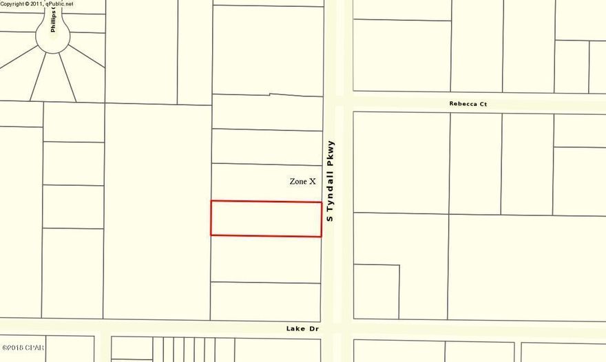 This interior property is .67 acres, and has approx. 100' of highway frontage. Ingress and egress are a cinch, as there is a median cut at the northern end for an additional entrance, already in place. Located in Flood Zone X, and zoned General Commercial (per Parker Zoning Office), this great location would be perfect for any number of commercial businesses. Traffic count per DOT is 24,500 to the north and 19,200 to the south. Property is located half way between the Callaway Super Walmart and the Tyndall Bridge, and won't last long. An additional contiguous parcel is also available, see MLS #682947.  Measurements approx.