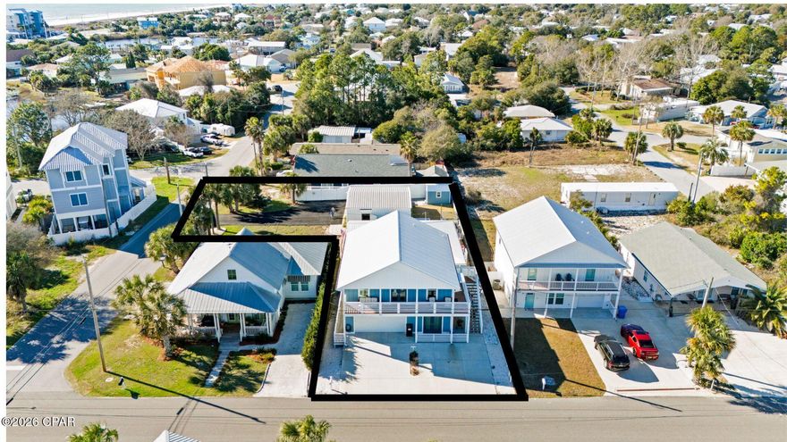 OPPORTUNITY ABOUNDS ON THIS LAGUNA BEACH PROPERTY!

Welcome to 209 Oleander Drive, ideally located in the heart of Panama City Beach on a spacious L-shaped lot, just steps from the sugar-white sands and emerald waters of the Gulf (less than 600 steps to the beach!). This versatile property is perfect as a primary residence, second home, or income producing short-term rental with two separate living spaces.

The main house, currently owner-occupied and remodeled in 2017, features bright living spaces and a functional, open flow that is welcoming for both owners and guests. Step outside to enjoy a private outdoor area perfect for relaxing after a day at the beach or entertaining visitors.

A standout feature is the 30x30 insulated workshop, offering endless possibilities. With plumbing already in place, it could easily be converted into an additional rental unit, used for a home business, or serve as storage for vehicles or a collection.

The property also includes a carriage house (ADU) built in 2023, complete with a two-car garage. Over the past two years, this unit has generated $20,000 annually in short-term rental income, making it an excellent opportunity for buyers seeking immediate investment potential. The two-car garage with separate entrance also offers the option to be converted into additional rental space.

Both homes include a full appliance package, tankless water heaters, walk-in showers, and smoke detectors. The property is connected to city water and sewer (no septic), with one shared water/sewer bill and two separate electric meters. Refer to upgrade list in document section.

Whether you're looking for a personal beach retreat, an income-producing property, or a combination of both, this unique opportunity offers flexibility, expansion potential, ample storage, and an unbeatable location.

Schedule your showing today and discover the possibilities of beach living and investment in Panama City Beach!